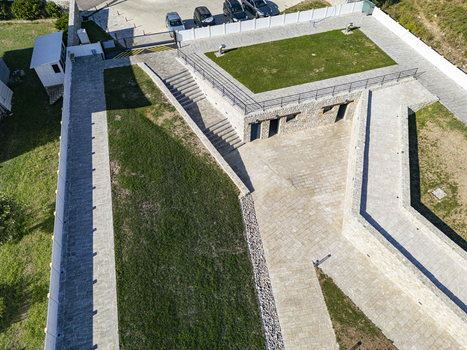 Aerial view of the Lead Mosque featuring stone paved courtyards stairs and manicured lawns in Shkoder Shkoder County Albania. Aerial view of the Lead Mosque featuring stone paved courtyards stairs and manicured lawns in Shkoder Shkoder County Albania.