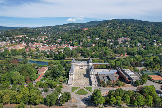 Aerial view of Castello del Valentino with its grand courtyard and lush greenery along the Po river Torino Piemonte Italy. Aerial view of Castello del Valentino with its grand courtyard and lush greenery along the Po river Torino Piemonte Italy.