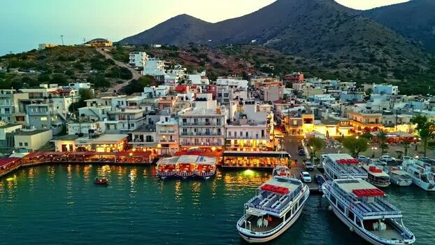 Aerial view of coastal town harbor in Crete Greece.