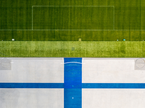 Berlin Germany 26 September 2026 Aerial view of Olympiastadion Berlin showing the vibrant green football pitch and the blue and white track markings.