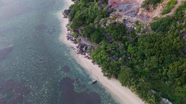 Aerial view of Praslin coastline and beach in Seychelles.