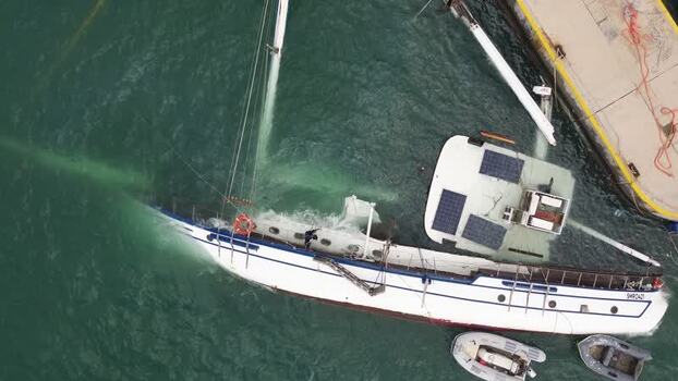 Aerial view of a capsized sailing vessel in the harbor Malta.
