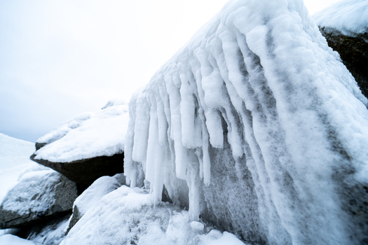 View of ice covered rocks and frozen structures near the Molenfeuer Sassnitz in Sassnitz Mecklenburg Vorpommern Germany.