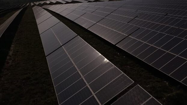 Aerial view of rows of solar panels at sunset Portugal. Aerial view of rows of solar panels at sunset Portugal.