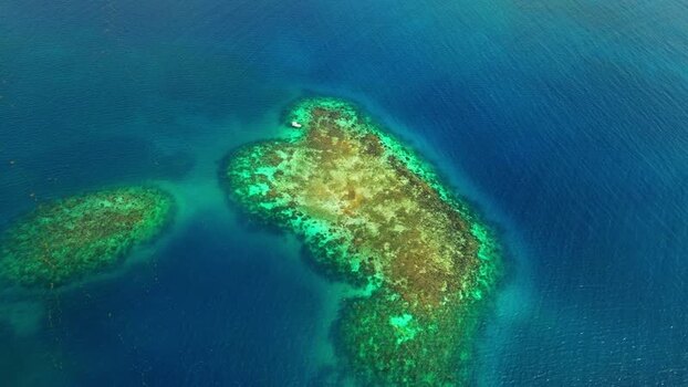 Aerial view of coral reefs and turquoise waters Honduras. Aerial view of coral reefs and turquoise waters Honduras.