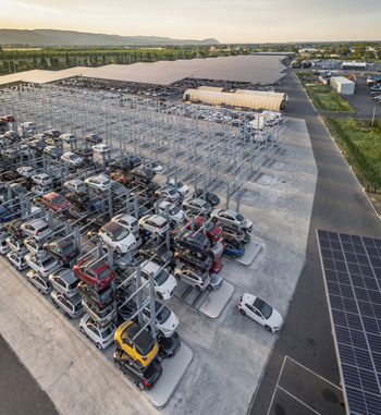 Livron sur Drome France 20 June 2026 Aerial view of an automated car storage facility with multi level stacking racks holding numerous vehicles under solar panel canopies. Livron sur Drome France 20 June 2026 Aerial view of an automated car storage facility with multi level stacking racks holding numerous vehicles under solar panel canopies.