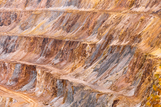 Geamana Romania 21 September 2026 Aerial view of the Geamana copper mine showing terraced slopes exposed mineral layers and industrial excavation patterns. Geamana Romania 21 September 2026 Aerial view of the Geamana copper mine showing terraced slopes exposed mineral layers and industrial excavation patterns.