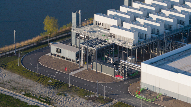 Drone view of a hyperscale data center in Eemshaven showing cloud computing server infrastructure cooling systems backup power and digital connectivity. Drone view of a hyperscale data center in Eemshaven showing cloud computing server infrastructure cooling systems backup power and digital connectivity.