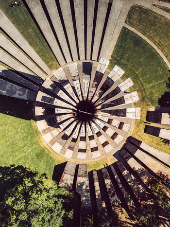Aerial view of the Monument to the Revolution at Mrakovica with its iconic circular concrete segments and radiating walls in Dera Republika Srpska Bosnia and Herzegovina.