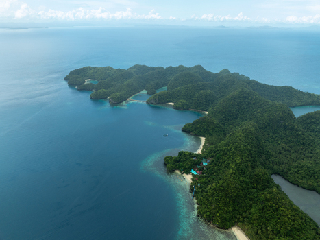 Aerial view of Bucas Grande islands with lush tropical vegetation turquoise waters and coral reefs in Siargao Philippines. Aerial view of Bucas Grande islands with lush tropical vegetation turquoise waters and coral reefs in Siargao Philippines.