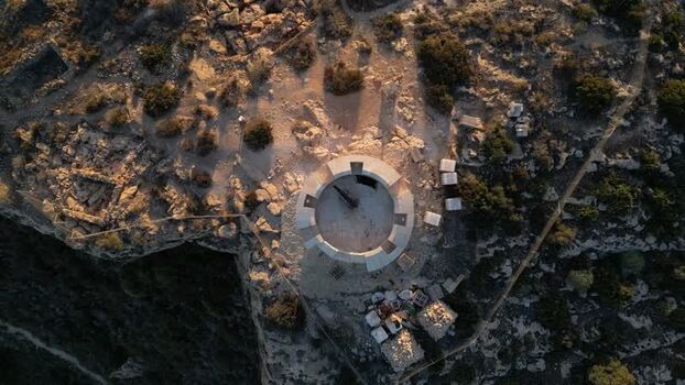 Aerial view of Moraira castle ruins on a cliff in Spain.
