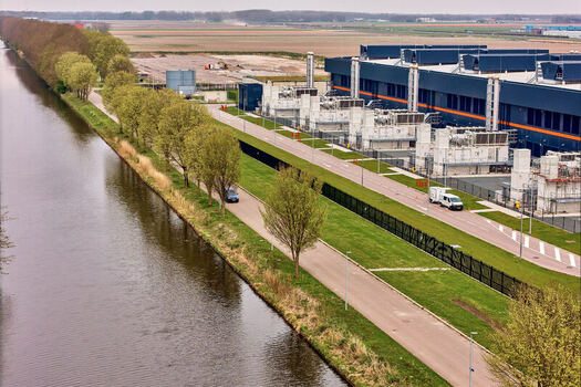 Middenmeer Netherlands 15 April 2026 Aerial view of the Microsoft Datacenter Campus AMS 13 and 14 with industrial cooling units a tree lined canal and flat agricultural landscape. Middenmeer Netherlands 15 April 2026 Aerial view of the Microsoft Datacenter Campus AMS 13 and 14 with industrial cooling units a tree lined canal and flat agricultural landscape.