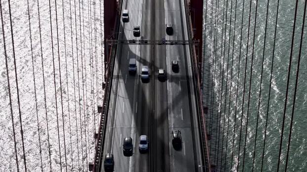 Aerial view of cars driving on Ponte 25 de Abril Portugal.