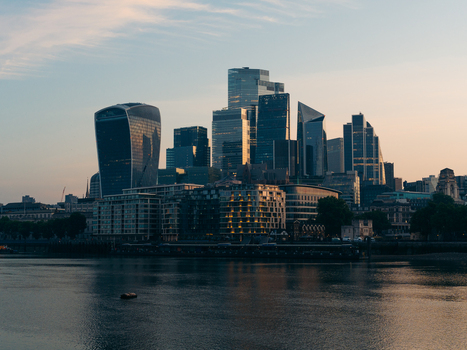 London United Kingdom 20 June 2025 View of the City of London s skyline a symphony of glass and steel reflecting the muted gold of the setting sun over the tranquil Thames. London United Kingdom 20 June 2025 View of the City of London s skyline a symphony of glass and steel reflecting the muted gold of the setting sun over the tranquil Thames.