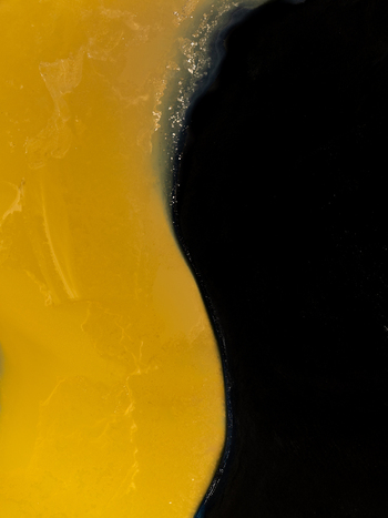 Aerial view of the coastline in Iceland showing the contrast between yellow volcanic sand and dark black lava rock in Reykjanesbaer Iceland. Aerial view of the coastline in Iceland showing the contrast between yellow volcanic sand and dark black lava rock in Reykjanesbaer Iceland.