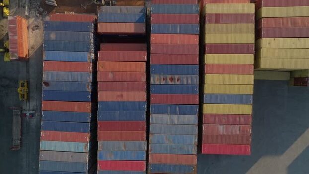 Aerial view of stacked shipping containers in Augusta Italy. Aerial view of stacked shipping containers in Augusta Italy.