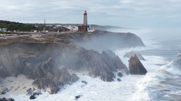 Aerial view of Farol Penedo da Saudade on rocky cliffs Portugal. Aerial view of Farol Penedo da Saudade on rocky cliffs Portugal.