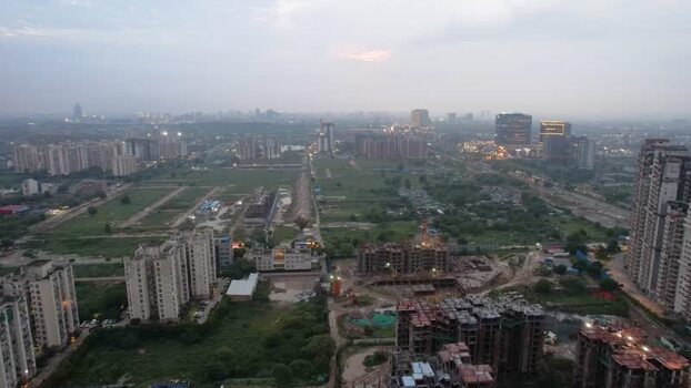 Aerial view of Gurugram cityscape at dusk India.