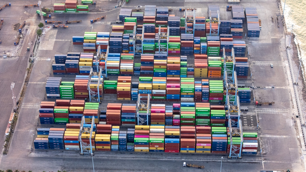 Semarang Central Java Indonesia 27 September 2026 Aerial view of the busy shipping port with rows of colorful cargo containers stacked in the terminal cranes and industrial infrastructure. Semarang Central Java Indonesia 27 September 2026 Aerial view of the busy shipping port with rows of colorful cargo containers stacked in the terminal cranes and industrial infrastructure.
