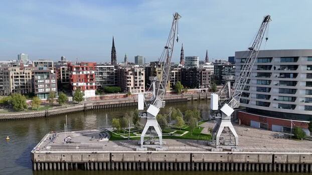 Aerial view of Strandkai with cranes in the Hafencity in Hamburg Germany.