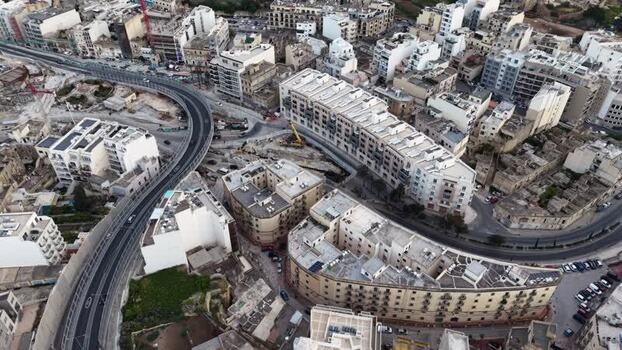 Aerial view of urban flyover and buildings in Msida Malta. Aerial view of urban flyover and buildings in Msida Malta.