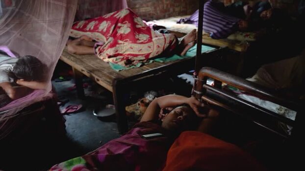 View of people sleeping in a dormitory in Bogura Bangladesh. View of people sleeping in a dormitory in Bogura Bangladesh.