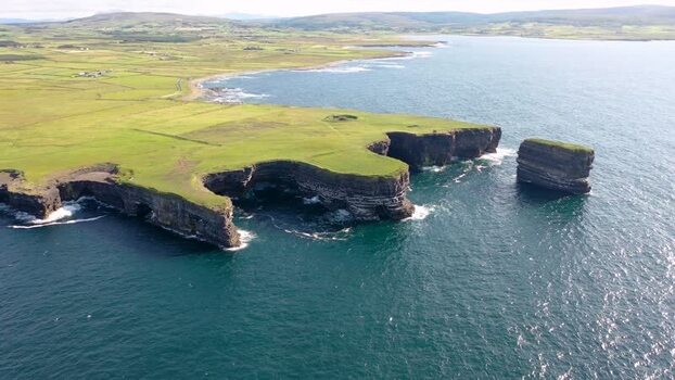 Aerial view of Dun Briste sea stack off the coast of Ireland. Aerial view of Dun Briste sea stack off the coast of Ireland.