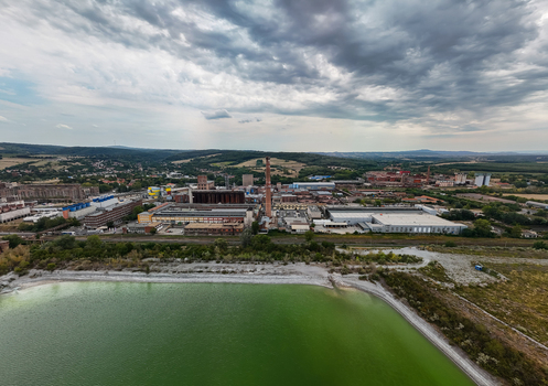 Aerial view of Ajka alumina factory with rail lines and waste pond Aerial view of Ajka alumina factory with rail lines and waste pond