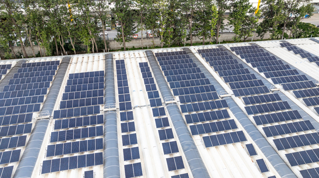 Aerial view of the extensive solar panel array installed on the roof of the Mercado Livre headquarters showcasing renewable energy infrastructure in Osasco State of Sao Paulo Brazil.