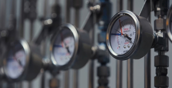 View of industrial pressure gauges mounted on metal pipes in a manufacturing facility in Ji Lin Shi Ji Lin Sheng China. View of industrial pressure gauges mounted on metal pipes in a manufacturing facility in Ji Lin Shi Ji Lin Sheng China.