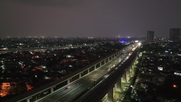 Aerial view of elevated highway at night in Bekasi Barat Indonesia. Aerial view of elevated highway at night in Bekasi Barat Indonesia.
