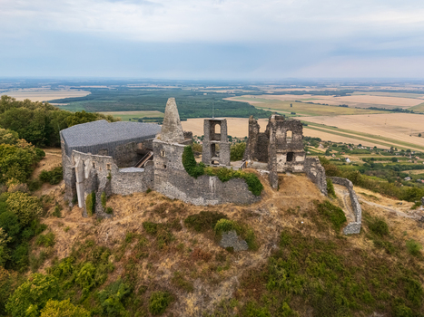 Aerial view of Somlo Castle ruins on Somlo Hill above Hungary s summer vineyards and forests Aerial view of Somlo Castle ruins on Somlo Hill above Hungary s summer vineyards and forests