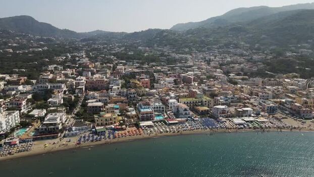 Aerial view of the coastal town and beach of Ischia Italy. Aerial view of the coastal town and beach of Ischia Italy.