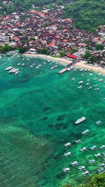 Aerial view of coastal town and boats in Bali Indonesia.