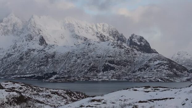 Aerial view of snow covered Lofoten mountains in Norway.