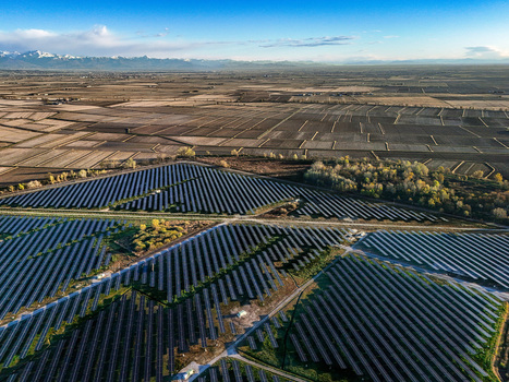 Trino Italy 30 March 2026 Aerial view of solar panels stretch like dark geometric tapestries across the landscape reflecting the sky amidst the golden fields. Trino Italy 30 March 2026 Aerial view of solar panels stretch like dark geometric tapestries across the landscape reflecting the sky amidst the golden fields.
