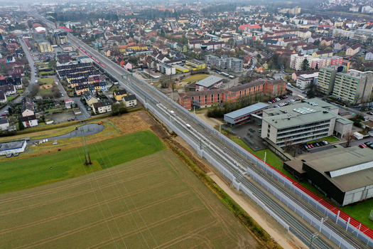 Aerial view of the town of Forchheim with railway tracks passing through residential and industrial districts Forchheim Bavaria Germany.