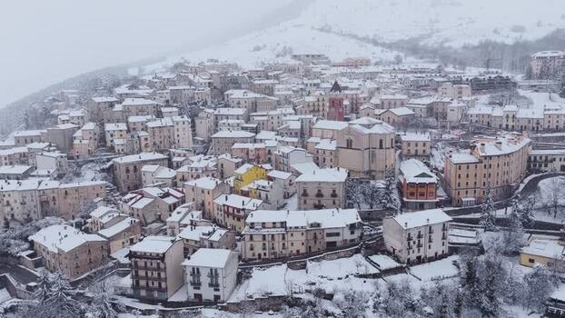 Aerial view of snowy Rivisondoli in the mountains Italy.