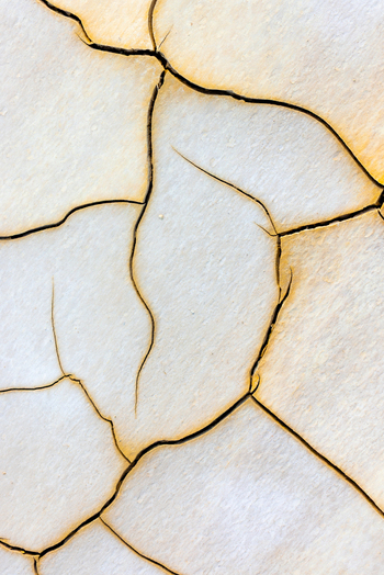 Aerial view of the intricate cracked patterns on the dry salt flats of Tuzbair in Mangystau District Mangystau Region Kazakhstan.