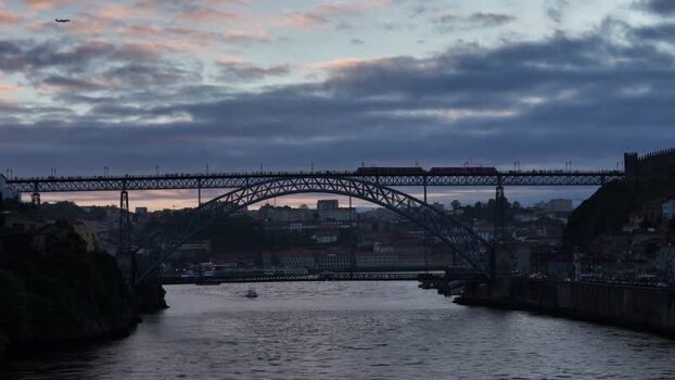 Aerial view of Dom Luís I Bridge with subway and airplane Portugal. Aerial view of Dom Luís I Bridge with subway and airplane Portugal.