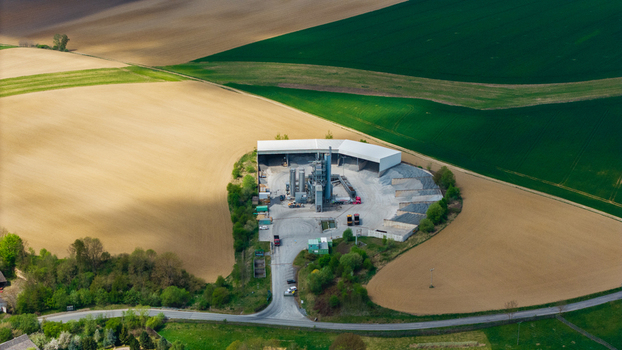 Aerial view of the asphalt plant in Zipotin surrounded by vast agricultural fields and rolling hills near Gruna Pardubicky kraj Czechia. Aerial view of the asphalt plant in Zipotin surrounded by vast agricultural fields and rolling hills near Gruna Pardubicky kraj Czechia.