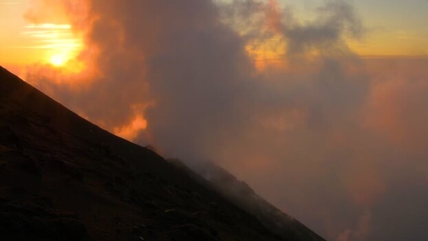 View of Stromboli volcano slope at sunset Italy.