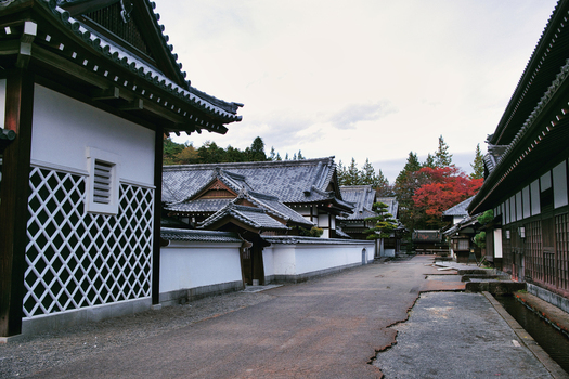 Nikko Tochigi Japan 02 November 2025 View of Edo Wonderland Nikko Edomura featuring traditional Japanese architecture with white plastered walls dark tiled roofs and autumn foliage. Nikko Tochigi Japan 02 November 2025 View of Edo Wonderland Nikko Edomura featuring traditional Japanese architecture with white plastered walls dark tiled roofs and autumn foliage.