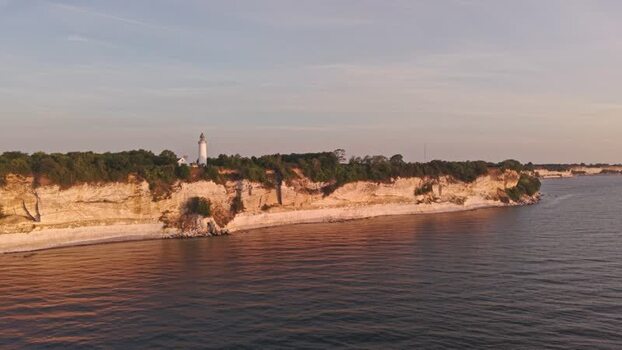 Aerial view of Stevns Klint lighthouse and cliffs Denmark.
