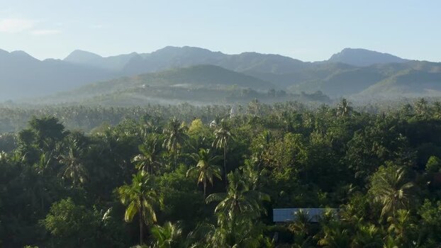 Aerial view of the tropical forest and mountains of Sumberkima Indonesia. Aerial view of the tropical forest and mountains of Sumberkima Indonesia.