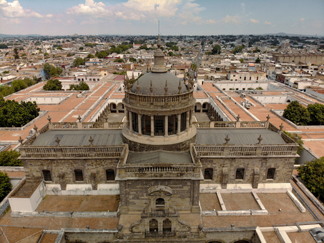 Aerial view of the historic Hospicio Cabanas with its iconic dome stone architecture and surrounding courtyards in the city center of Guadalajara Jalisco Mexico. Aerial view of the historic Hospicio Cabanas with its iconic dome stone architecture and surrounding courtyards in the city center of Guadalajara Jalisco Mexico.