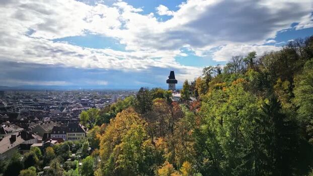 Aerial view of Schlossberg and the clock tower in Graz Austria.