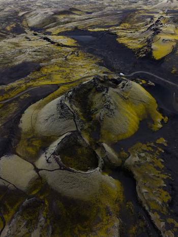 Aerial view of moss covered volcanic rock formations creating a striking tapestry of textures and colors Lakagigar Iceland. Aerial view of moss covered volcanic rock formations creating a striking tapestry of textures and colors Lakagigar Iceland.