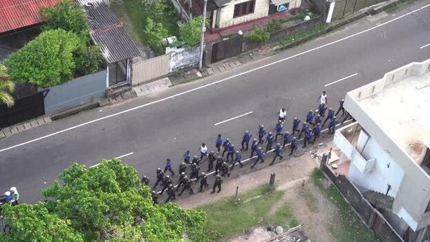 View of security forces marching along a street Sri Lanka. View of security forces marching along a street Sri Lanka.