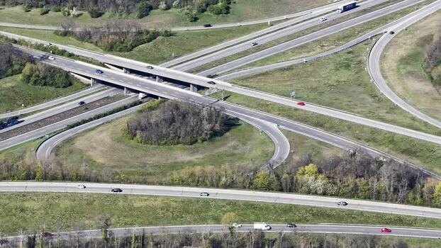 Aerial view of highway interchange with vehicles France.